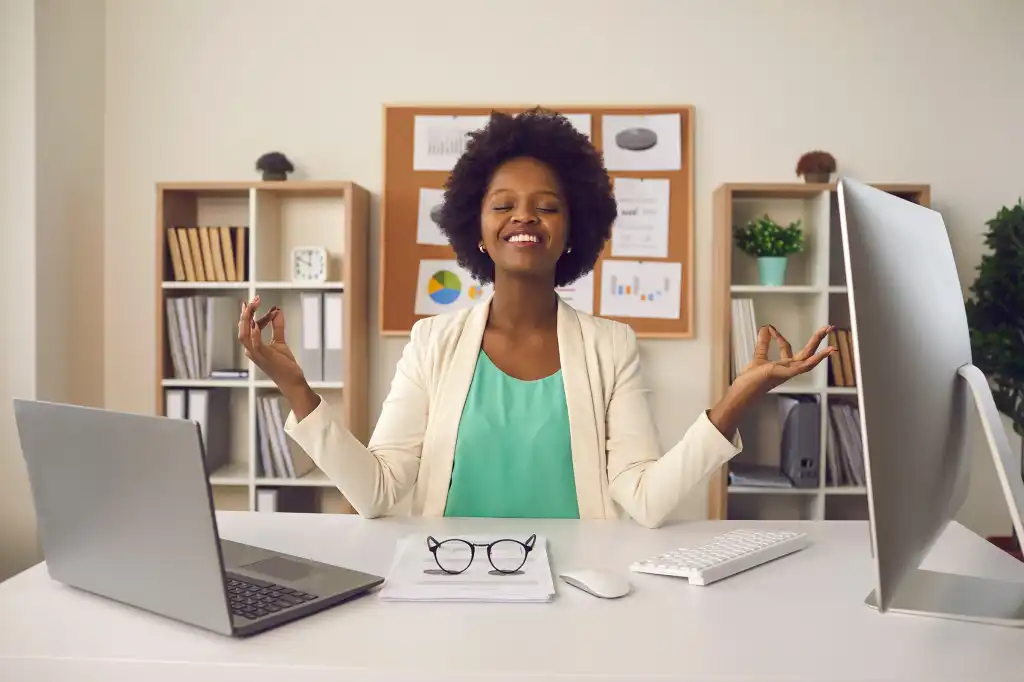 Happy employee celebrating success at work